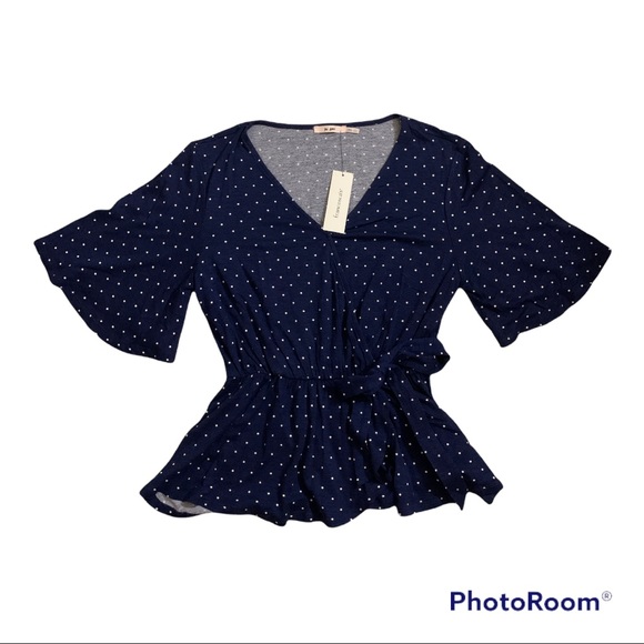 Size XXS Francesca‘s navy blue with white polkadots top. - Picture 1 of 2